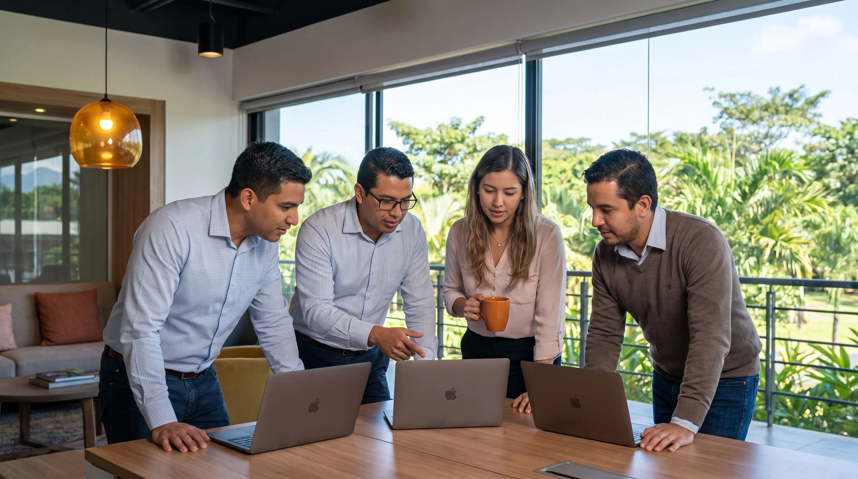 Node.js developers collaborating in a modern Costa Rica tech office