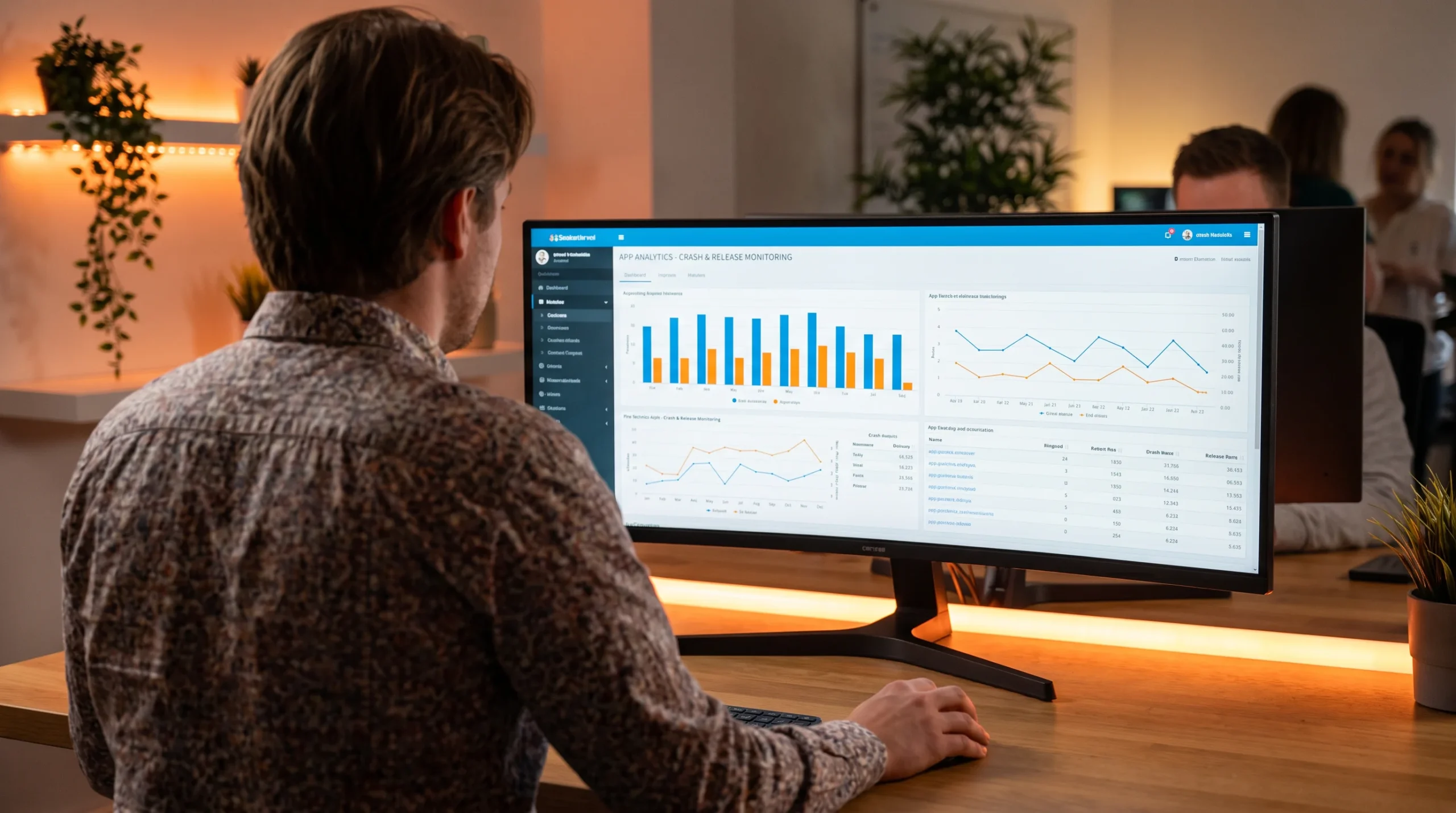 Developer reviewing an app analytics dashboard tracking crash rates and release monitoring