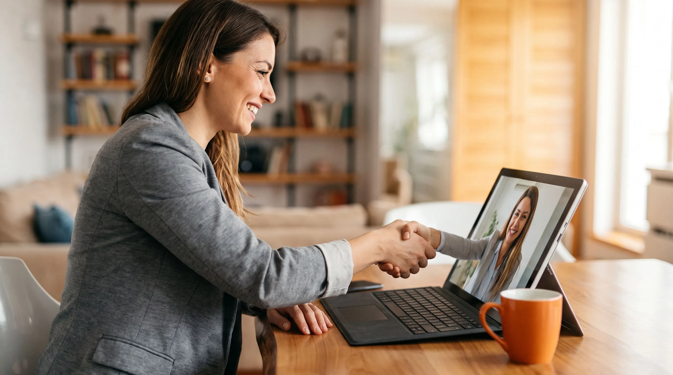 Business leader selecting nearshore staffing partner from shortlist on screen