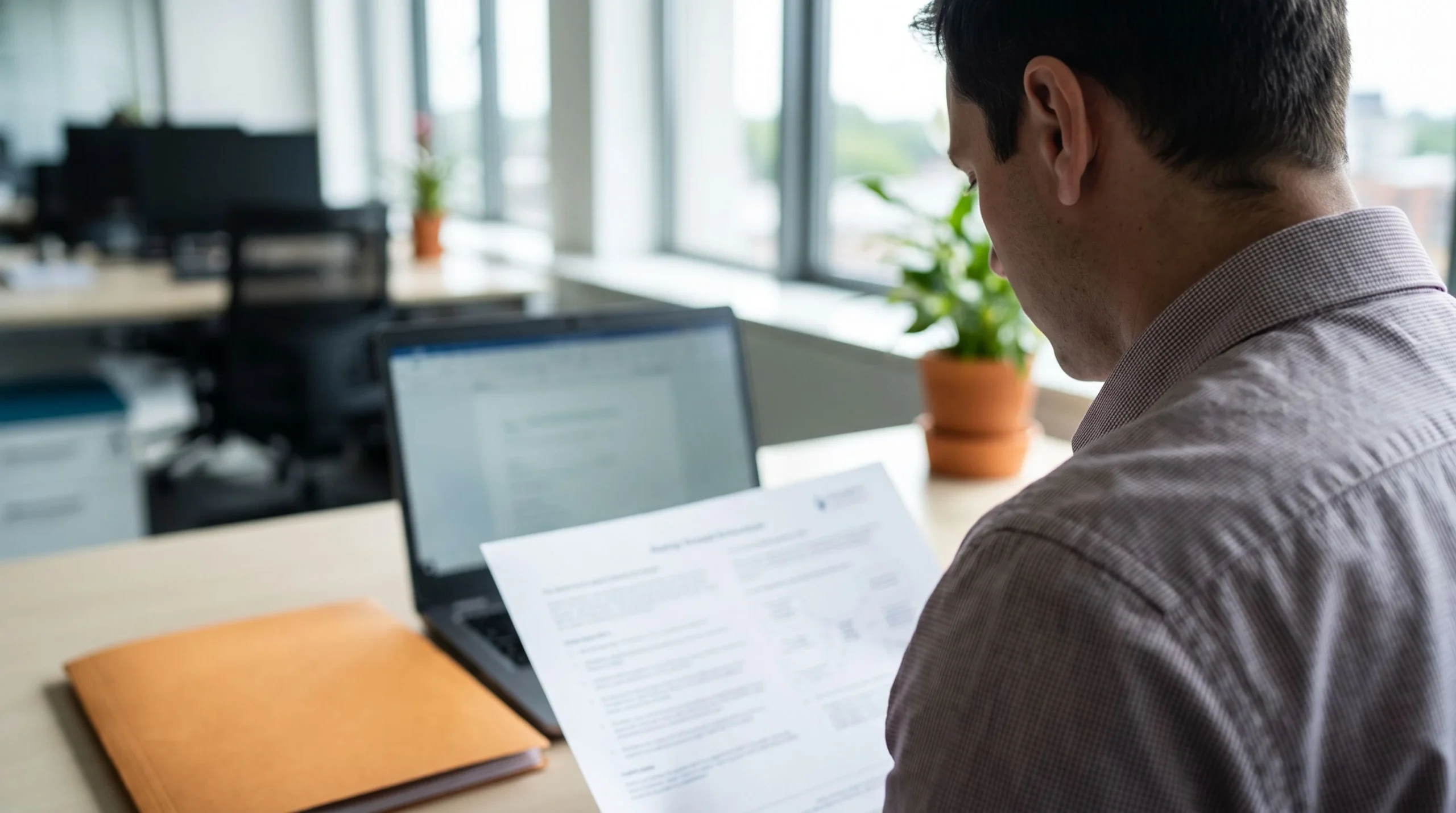 Operations lead reviewing an outstaffing compliance and employer of record agreement