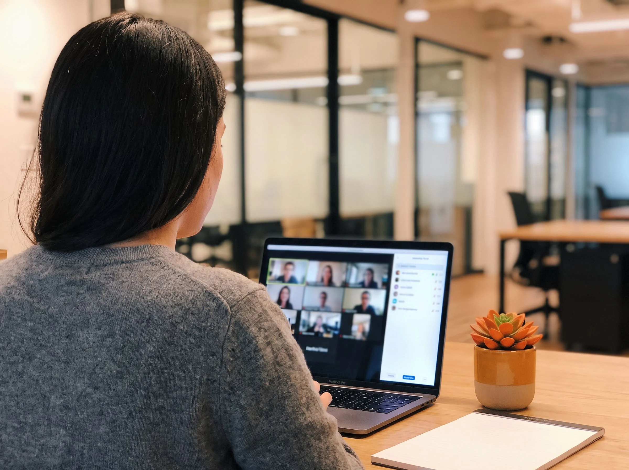 Technical interviewer screening a developer candidate over a video call for an outstaffing role