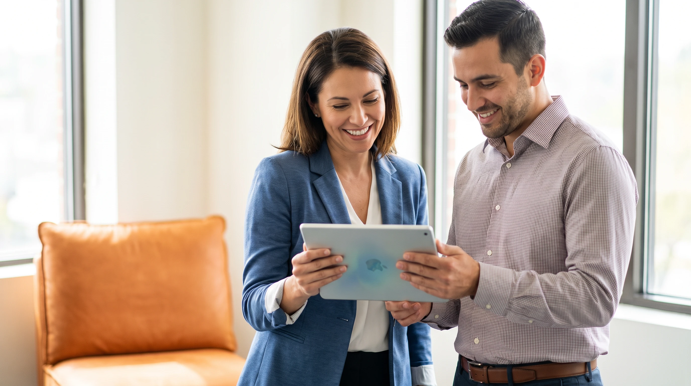 Small business owner and Kore BPO account manager reviewing monthly financials together