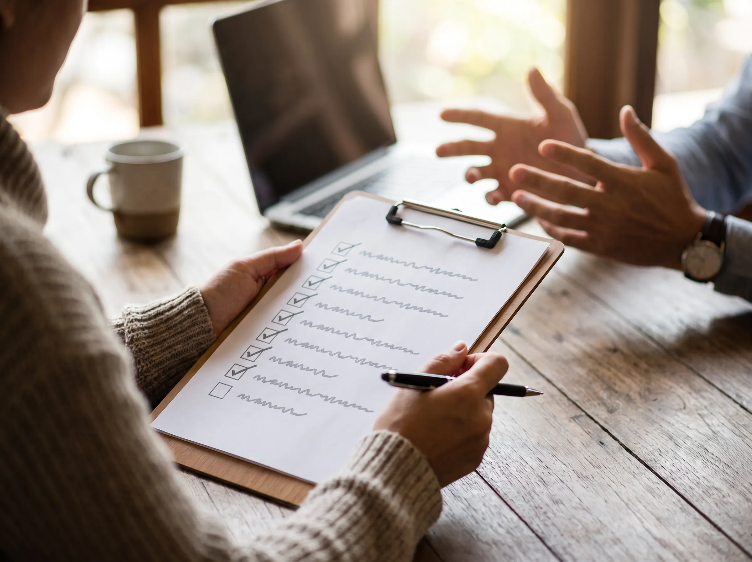 Reviewing a vendor checklist before signing with a social media outsourcing partner